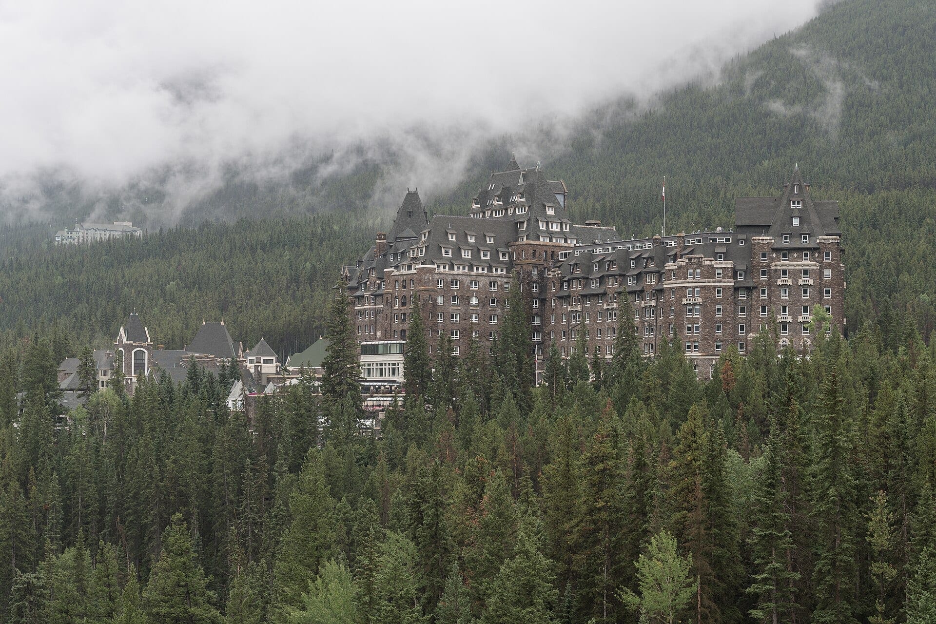 The castle-like Fairmont Banff Springs hotel set against the Canadian Rockies, seen from Surprise Corner