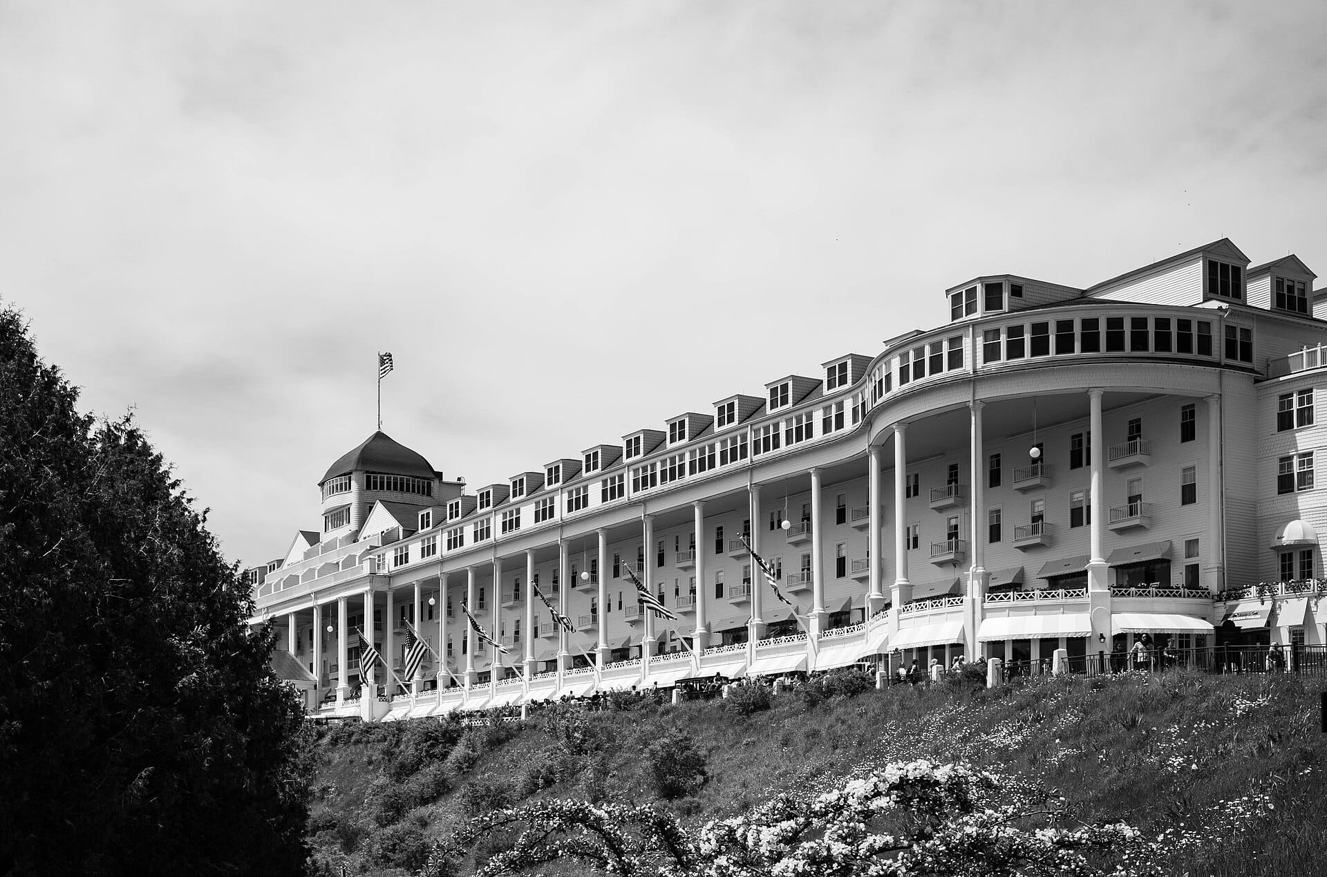 The white columned facade and famous long porch of the Grand Hotel on Mackinac Island
