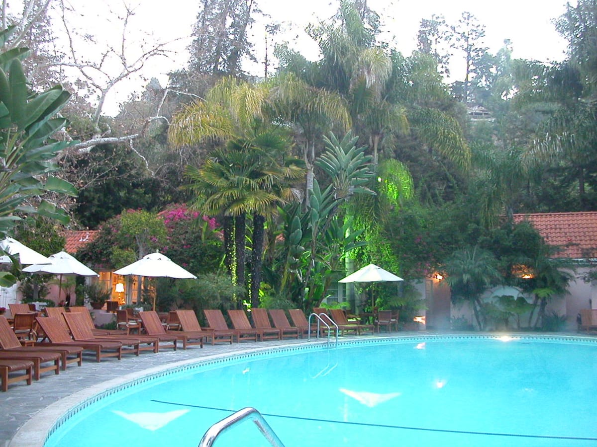 The swimming pool and lush gardens of the Hotel Bel-Air in Stone Canyon, Los Angeles