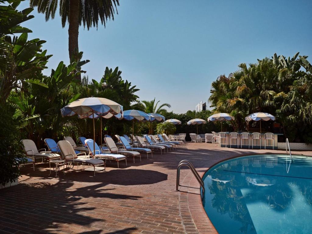 Sunbathe at will. Howard Hughes is no longer in residence on the eighth floor to spy on you